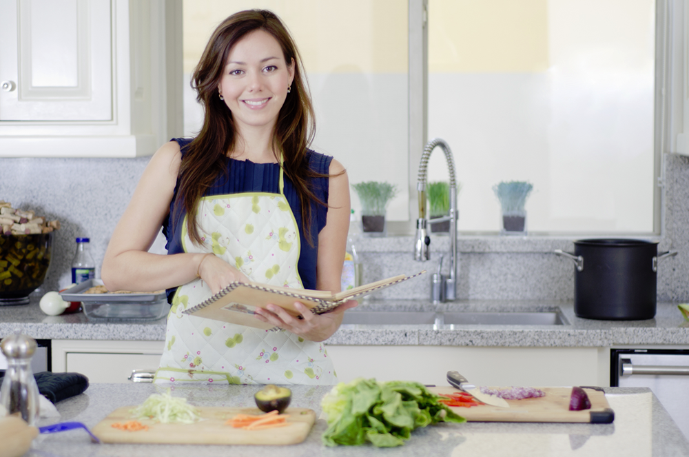 granite counter woman cooking food